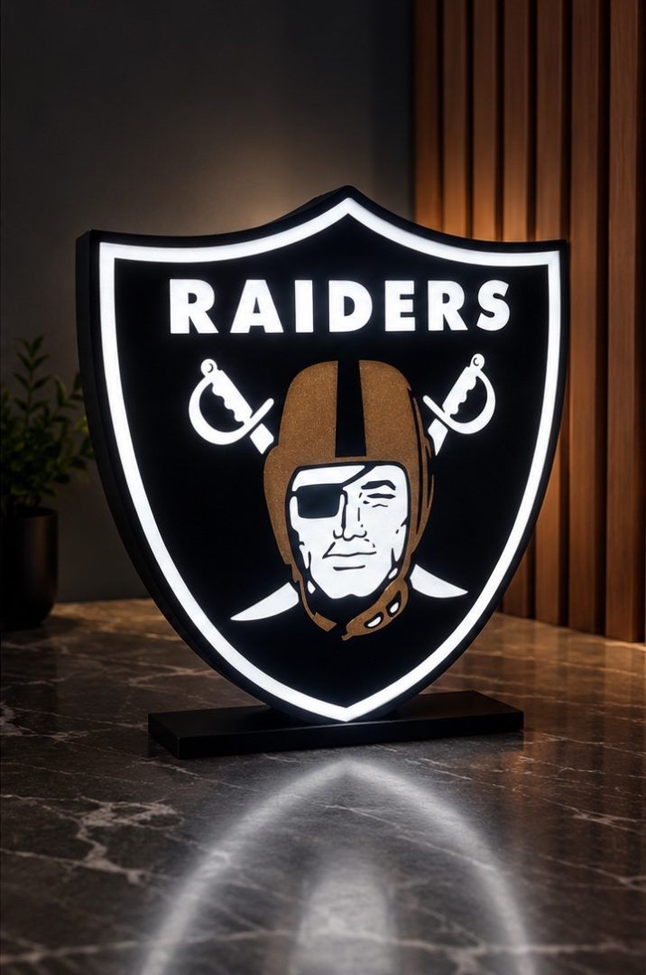 Lit Raiders shield lightbox on a marble counter