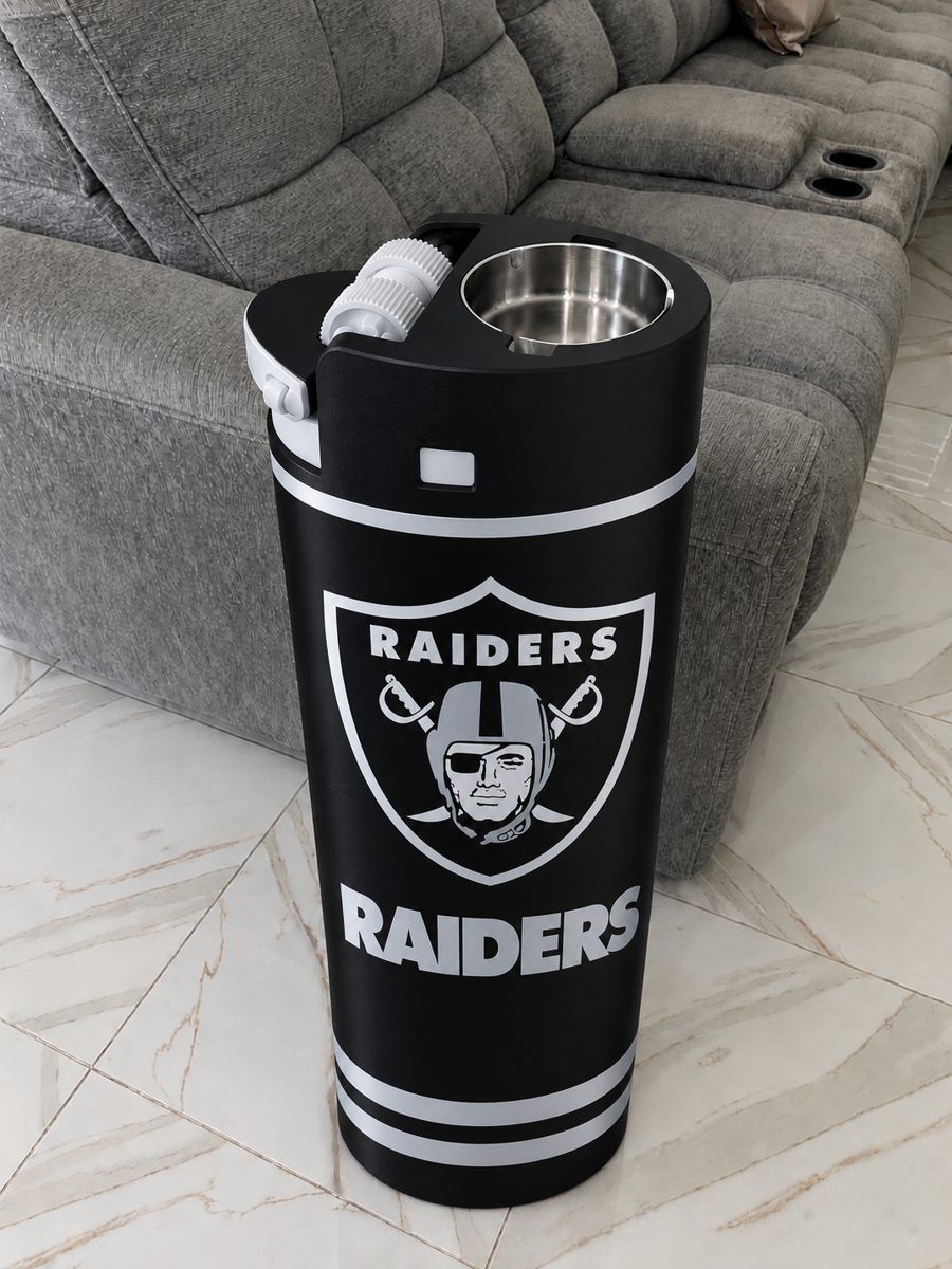 Black Raiders drink and ashtray stand next to a couch